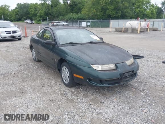 ✅ 1997 Saturn SC • VIN: 1G8ZF1285VZ100218 • Лот: 42881895. Опубликован ранее на IAAI с пробегом 114 002 миль. Бесплатный доступ к архиву аукционных продаж из США и подробный отчёт об истории автомобиля на DreamBid. Изображение 1.