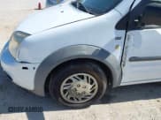 ✅ 2010 Ford Transit Connect XLT • VIN: NM0LS7BN3AT028235 • Lot: 43071653. Wystawiony na IAAI z przebiegiem 291 343 mil. Bezpłatny archiwum sprzedaży aukcyjnych z USA i szczegółowy raport historii pojazdu na DreamBid. Zdjęcie 6.