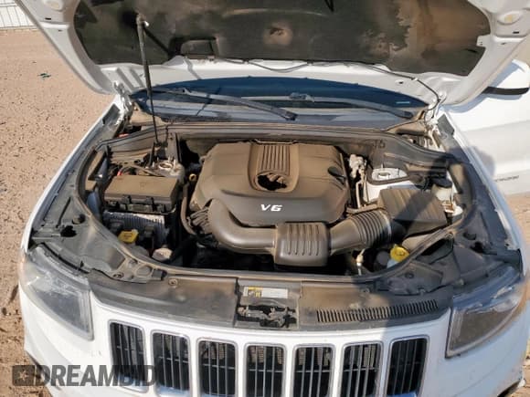 ✅ 2015 Jeep Grand Cherokee Laredo • VIN: 1C4RJEAG4FC109095 • Lot: 70170205. Listed on Copart with 83,614 mi. Free auction sales archive from the USA and detailed vehicle history report at DreamBid. Image 12.