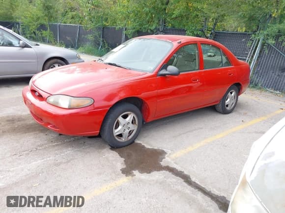 ✅ 2000 Ford Escort • VIN: 3FAFP13P2YR167076 • Лот: 43229335. Опубликован ранее на IAAI с пробегом 308 625 миль. Бесплатный доступ к архиву аукционных продаж из США и подробный отчёт об истории автомобиля на DreamBid. Изображение 2.