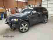 2014 Jeep Grand Cherokee Limited z VIN 1C4RJFBGXEC204652, wystawiony jako Copart lot #80250105 z przebiegiem Nie podano mil oraz Szkoda całkowita • Salvage title. Historia ofert i sprzedaży dostępna na DreamBid. Obrazek 1.