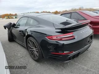 ✅ 2017 Porsche 911 Turbo S • VIN: WP0AD2A95HS167360 • Lot: 86816865. Wystawiony na Copart z przebiegiem 18 478 mil. Bezpłatny archiwum sprzedaży aukcyjnych z USA i szczegółowy raport historii pojazdu na DreamBid. Zdjęcie 2.