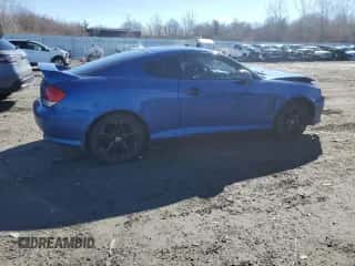 2005 Hyundai Tiburon GT z VIN KMHHN65F35U169736, wystawiony jako Copart lot #47422885 z przebiegiem 136 205 mil mil oraz Czysty tytuł • Clean title. Historia ofert i sprzedaży dostępna na DreamBid. Obrazek 3.