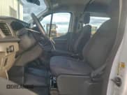 ✅ 2023 Ford Transit Cargo • VIN: 1FTBR2Y88PKB40932 • Lot: 94312165. Listed on Copart with 25,441 mi. Free auction sales archive from the USA and detailed vehicle history report at DreamBid. Image 7.