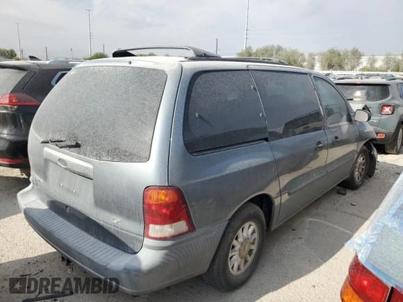 ✅ 1999 Ford Windstar LX • VIN: 2FMZA5145XBA21885 • Lot: 61294665. Listed on Copart with 186,452 mi. Free auction sales archive from the USA and detailed vehicle history report at DreamBid. Image 3.