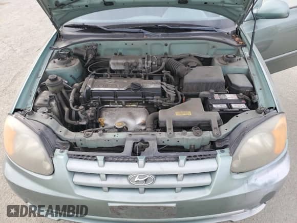 2004 Hyundai Accent GL с VIN KMHCG45C14U540938, выставлен на аукционе Copart как лот 46701935 с пробегом 71 891 миль миль и Списание • Salvage title. История ставок и продаж доступна на DreamBid. Изображение 11.