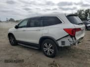 ✅ 2017 Honda Pilot EX-L • VIN: 5FNYF6H77HB031118 • Lot: 81370035. Listed on Copart with 166,144 mi. Free auction sales archive from the USA and detailed vehicle history report at DreamBid. Image 2.