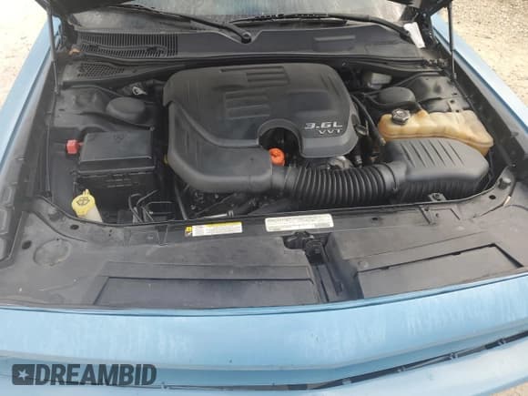 ✅ 2012 Dodge Challenger SXT Plus • VIN: 2C3CDYAG7CH100693 • Лот: 84772665. Опубликован ранее на Copart с пробегом 129 067 миль. Бесплатный доступ к архиву аукционных продаж из США и подробный отчёт об истории автомобиля на DreamBid. Изображение 11.