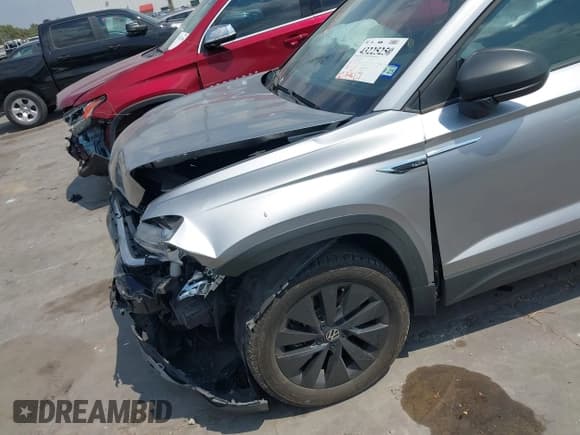 ✅ 2023 Volkswagen Taos S • VIN: 3VVCX7B28PM367186 • Лот: 43225250. Опубликован ранее на IAAI с пробегом 27 945 миль. Бесплатный доступ к архиву аукционных продаж из США и подробный отчёт об истории автомобиля на DreamBid. Изображение 19.