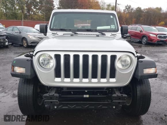 ✅ 2022 Jeep Wrangler Unlimited Sport S • VIN: 1C4HJXDG3NW132089 • Lot: 43575037. Listed on IAAI with 64,052 mi. Free auction sales archive from the USA and detailed vehicle history report at DreamBid. Image 12.