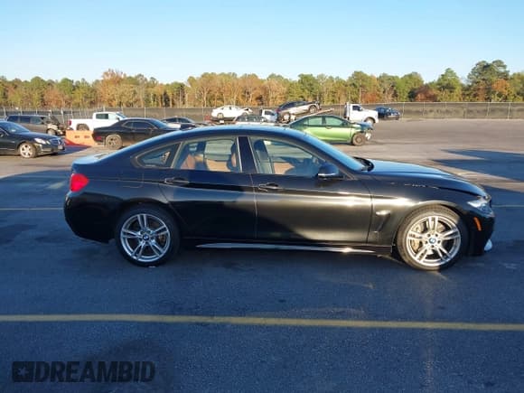 ✅ 2016 BMW 4 Series 428i xDrive • VIN: WBA4C9C57GG139464 • Lot: 43662401. Listed on IAAI with 83,876 mi. Free auction sales archive from the USA and detailed vehicle history report at DreamBid. Image 13.