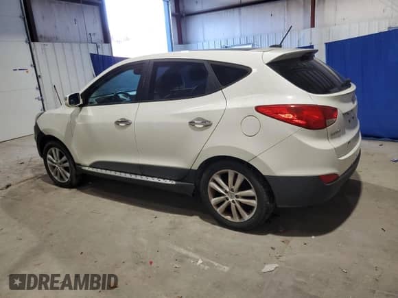 2012 Hyundai Tucson Limited z VIN KM8JUCAC4CU381590, wystawiony jako Copart lot #91350795 z przebiegiem 510 791 mil mil oraz Czysty tytuł • Clean title. Historia ofert i sprzedaży dostępna na DreamBid. Obrazek 2.