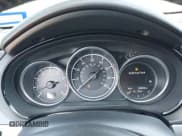 ✅ 2018 Mazda CX-9 Grand Touring • VIN: JM3TCADY7J0208167 • Lot: 43487387. Wystawiony na IAAI z przebiegiem 93 859 mil. Bezpłatny archiwum sprzedaży aukcyjnych z USA i szczegółowy raport historii pojazdu na DreamBid. Zdjęcie 7.