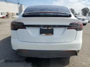 ✅ 2023 Tesla Model X • VIN: 7SAXCBE54PF403581 • Lot: 81604995. Wystawiony na Copart z przebiegiem Nie podano. Bezpłatny archiwum sprzedaży aukcyjnych z USA i szczegółowy raport historii pojazdu na DreamBid. Zdjęcie 6.