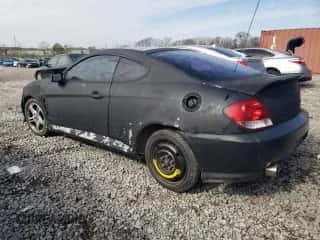 2006 Hyundai Tiburon GT с VIN KMHHN65F86U221847, выставлен на аукционе Copart как лот 42923865 с пробегом 188 494 миль миль и Списание • Salvage title. История ставок и продаж доступна на DreamBid. Изображение 2.
