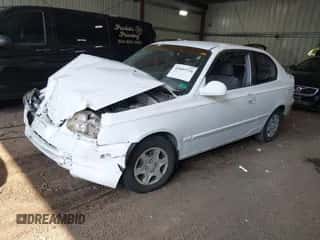 2004 Hyundai Accent GL z VIN KMHCG35C64U306062, wystawiony jako IAAI lot #42685736 z przebiegiem 150 574 mil mil oraz . Historia ofert i sprzedaży dostępna na DreamBid. Obrazek 2.