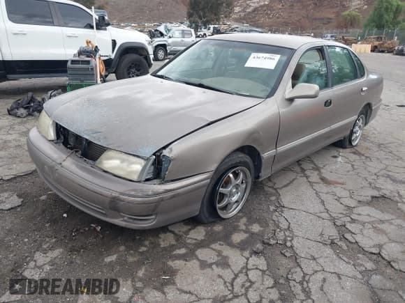 ✅ 1998 Toyota Avalon XL • VIN: 4T1BF18B6WU243196 • Lot: 43674986. Listed on IAAI with 173,838 mi. Free auction sales archive from the USA and detailed vehicle history report at DreamBid. Image 2.