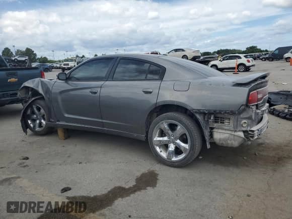 2012 Dodge Charger SXT с VIN 2C3CDXHG6CH126234, выставлен на аукционе Copart как лот 70297715 с пробегом 142 644 миль миль и Списание • Salvage title. История ставок и продаж доступна на DreamBid. Изображение 2.