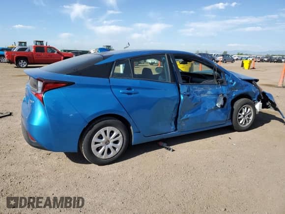 2021 Toyota Prius L Eco с VIN JTDKAMFU1M3143809, выставлен на аукционе Copart как лот 64057345 с пробегом 130 260 миль миль и Списание • Salvage title. История ставок и продаж доступна на DreamBid. Изображение 3.