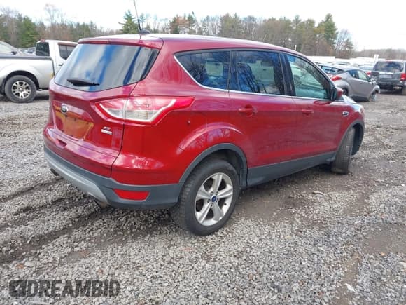 ✅ 2015 Ford Escape SE • VIN: 1FMCU9GXXFUC52909 • Lot: 43738409. Listed on IAAI with 125,363 mi. Free auction sales archive from the USA and detailed vehicle history report at DreamBid. Image 4.