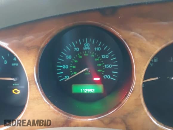 ✅ 2003 Jaguar XK • VIN: SAJDA42BX33A34653 • Лот: 43802371. Опубликован ранее на IAAI с пробегом 112 992 миль. Бесплатный доступ к архиву аукционных продаж из США и подробный отчёт об истории автомобиля на DreamBid. Изображение 7.