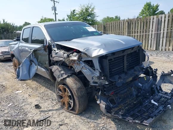 ✅ 2023 GMC Canyon 4WD AT4 • VIN: 1GTP6DEK6P1143991 • Lot: 42865413. Listed on IAAI with 49,712 mi. Free auction sales archive from the USA and detailed vehicle history report at DreamBid. Image 1.