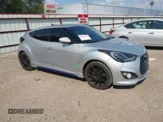 2015 Hyundai Veloster Turbo R-Spec with VIN KMHTC6AE0FU225114, listed as a IAAI auction lot 43236842 with 144,138 mi miles and . Bid and sale history available at DreamBid. Image 1.