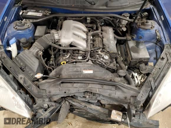 2010 Hyundai Genesis Coupe Track z VIN KMHHU6KH3AU023985, wystawiony jako Copart lot #47077255 z przebiegiem Nie podano mil oraz Szkoda całkowita • Salvage title. Historia ofert i sprzedaży dostępna na DreamBid. Obrazek 11.