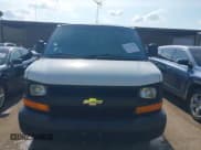 ✅ 2014 Chevrolet Express Cargo • VIN: 1GCWGFCG0E1100859 • Lot: 42142748. Listed on IAAI with 182,900 mi. Free auction sales archive from the USA and detailed vehicle history report at DreamBid. Image 12.