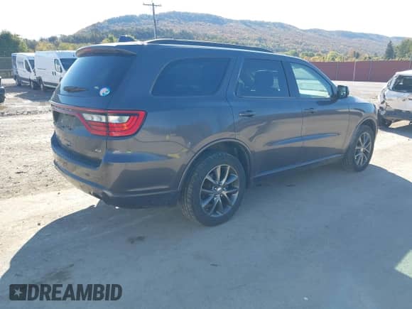 2017 Dodge Durango GT z VIN 1C4RDJDG7HC758081, wystawiony jako IAAI lot #43483626 z przebiegiem 102 657 mil mil oraz . Historia ofert i sprzedaży dostępna na DreamBid. Obrazek 4.