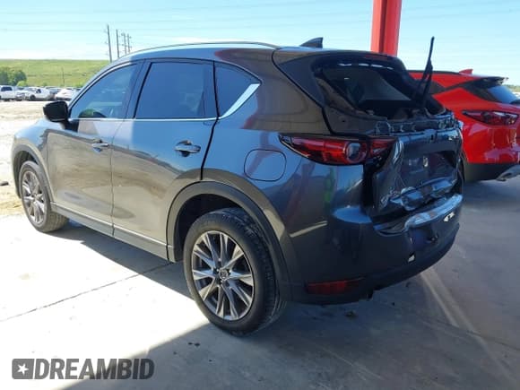 ✅ 2021 Mazda CX-5 Grand Touring • VIN: JM3KFADM9M1381655 • Lot: 43436750. Wystawiony na IAAI z przebiegiem 64 217 mil. Bezpłatny archiwum sprzedaży aukcyjnych z USA i szczegółowy raport historii pojazdu na DreamBid. Zdjęcie 3.