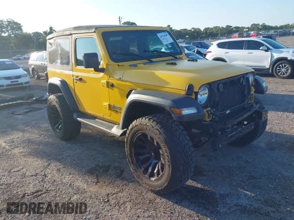 ✅ 2020 Jeep Wrangler Sport S • VIN: 1C4GJXAN7LW215407 • Lot: 42840160. Listed on IAAI with 52,889 mi. Free auction sales archive from the USA and detailed vehicle history report at DreamBid. Image 1.