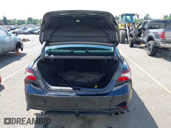 2022 Toyota Camry SE with VIN 4T1G11BK1NU050000, listed as a IAAI auction lot 42348766 with 57,429 mi miles and . Bid and sale history available at DreamBid. Image 16.