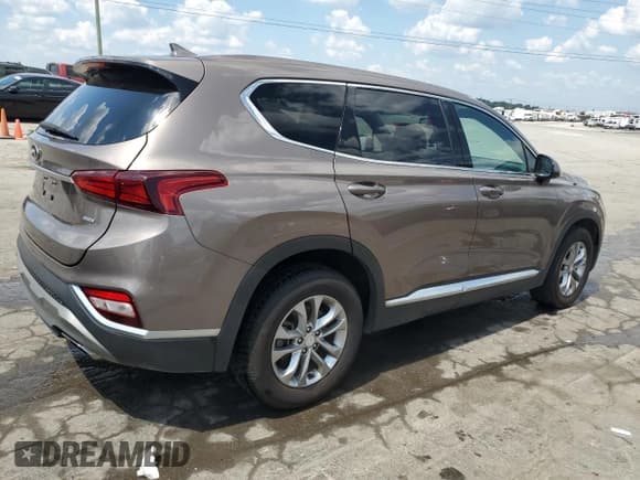 ✅ 2020 Hyundai Santa Fe SEL • VIN: 5NMS3CAD8LH232319 • Lot: 68578874. Wystawiony na Copart z przebiegiem 74 719 mil. Bezpłatny archiwum sprzedaży aukcyjnych z USA i szczegółowy raport historii pojazdu na DreamBid. Zdjęcie 3.