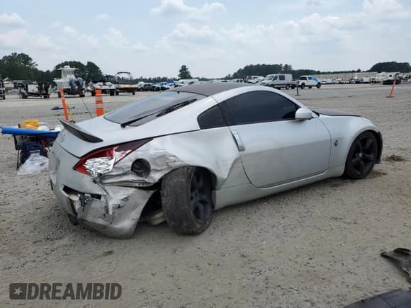 ✅ 2006 Nissan 350Z Enthusiast • VIN: JN1AZ34D06M307987 • Лот: 62513835. Опубликован ранее на Copart с пробегом 184 988 миль. Бесплатный доступ к архиву аукционных продаж из США и подробный отчёт об истории автомобиля на DreamBid. Изображение 3.