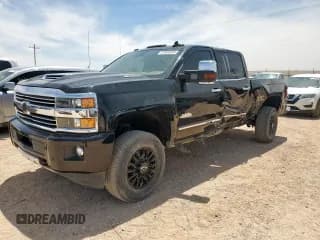 ✅ 2017 Chevrolet Silverado 2500HD High Country • VIN: 1GC1KXEY4HF160087 • Лот: 57040825. Опубликован ранее на Copart с пробегом 86 926 миль. Бесплатный доступ к архиву аукционных продаж из США и подробный отчёт об истории автомобиля на DreamBid. Изображение 1.