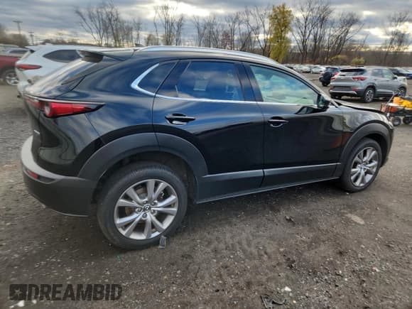 ✅ 2021 Mazda CX-30 Premium • VIN: 3MVDMBDM0MM218214 • Lot: 92629905. Listed on Copart with 75,604 mi. Free auction sales archive from the USA and detailed vehicle history report at DreamBid. Image 3.