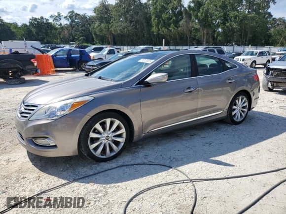 ✅ 2012 Hyundai Azera • VIN: KMHFH4JG1CA166964 • Лот: 71213125. Опубликован ранее на Copart с пробегом 181 191 миль. Бесплатный доступ к архиву аукционных продаж из США и подробный отчёт об истории автомобиля на DreamBid. Изображение 1.