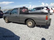 ✅ 1995 Isuzu Pickup S • VIN: JAACL11L8S7200788 • Лот: 51145765. Опубликован ранее на Copart с пробегом 328 108 миль. Бесплатный доступ к архиву аукционных продаж из США и подробный отчёт об истории автомобиля на DreamBid. Изображение 2.