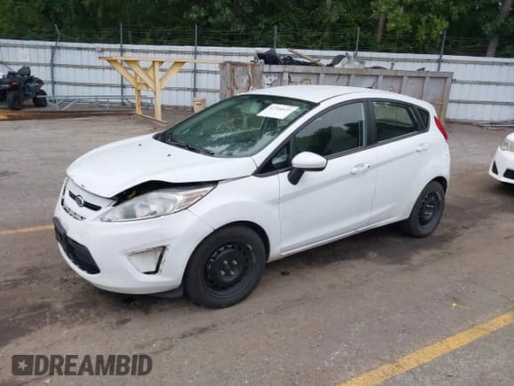✅ 2013 Ford Fiesta S • VIN: 3FADP4TJ1DM222984 • Lot: 42766623. Listed on IAAI with 228,073 mi. Free auction sales archive from the USA and detailed vehicle history report at DreamBid. Image 2.