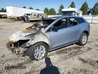 ✅ 2007 Mazda CX-7 Touring • VIN: JM3ER293970126556 • Lot: 87402975. Wystawiony na Copart z przebiegiem Nie podano. Bezpłatny archiwum sprzedaży aukcyjnych z USA i szczegółowy raport historii pojazdu na DreamBid. Zdjęcie 1.