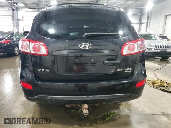✅ 2011 Hyundai Santa Fe SE • VIN: 5XYZHDAG0BG011063 • Lot: 68551274. Listed on Copart with 153,011 mi. Free auction sales archive from the USA and detailed vehicle history report at DreamBid. Image 6.