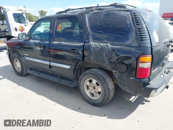 ✅ 2001 GMC Yukon SLE • VIN: 1GKEC13T21J134663 • Lot: 43312347. Listed on IAAI with 322,513 mi. Free auction sales archive from the USA and detailed vehicle history report at DreamBid. Image 3.