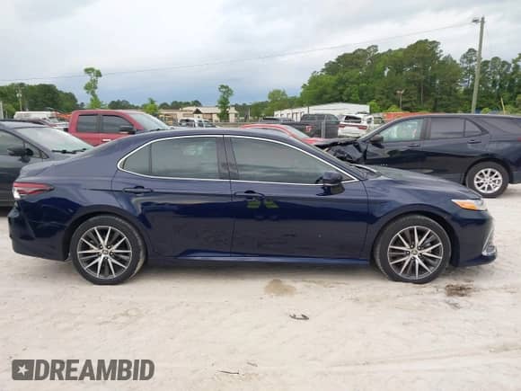 2022 Toyota Camry Hybrid XLE with VIN 4T1F31AK4NU591517, listed as a IAAI auction lot 42216959 with 36,048 mi miles and . Bid and sale history available at DreamBid. Image 13.