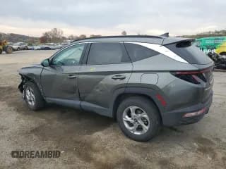 ✅ 2022 Hyundai Tucson SEL • VIN: 5NMJBCAE2NH141010 • Lot: 77138704. Wystawiony na Copart z przebiegiem 18 082 mil. Bezpłatny archiwum sprzedaży aukcyjnych z USA i szczegółowy raport historii pojazdu na DreamBid. Zdjęcie 2.