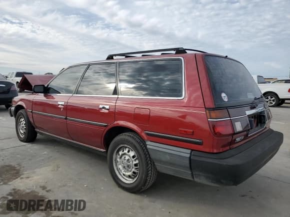 ✅ 1988 Toyota Camry • VIN: JT2SV21W9J0191632 • Lot: 82323554. Wystawiony na Copart z przebiegiem 145 961 mil. Bezpłatny archiwum sprzedaży aukcyjnych z USA i szczegółowy raport historii pojazdu na DreamBid. Zdjęcie 2.