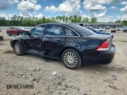 ✅ 2005 Mercury Montego Premier • VIN: 1MEFM43195G605951 • Лот: 62866455. Опубликован ранее на Copart с пробегом 309 706 миль. Бесплатный доступ к архиву аукционных продаж из США и подробный отчёт об истории автомобиля на DreamBid. Изображение 2.
