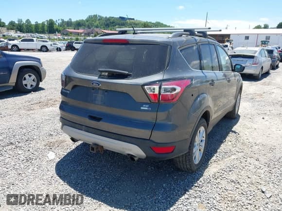 ✅ 2017 Ford Escape SE • VIN: 1FMCU9G9XHUD90910 • Lot: 42333320. Wystawiony na IAAI z przebiegiem 103 073 mil. Bezpłatny archiwum sprzedaży aukcyjnych z USA i szczegółowy raport historii pojazdu na DreamBid. Zdjęcie 4.