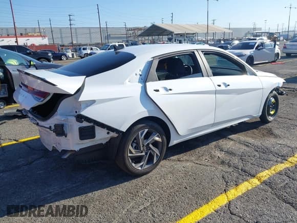 ✅ 2025 Hyundai Elantra SEL Sport • VIN: KMHLM4DG8SU868562 • Lot: 43215752. Listed on IAAI with 6,517 mi. Free auction sales archive from the USA and detailed vehicle history report at DreamBid. Image 4.
