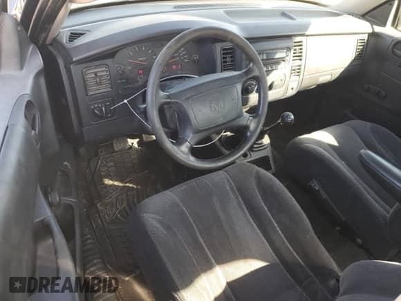 2004 Dodge Dakota с VIN 1D7GL12K24S670157, выставлен на аукционе Copart как лот 77800934 с пробегом 102 769 миль миль и Списание • Salvage title. История ставок и продаж доступна на DreamBid. Изображение 8.